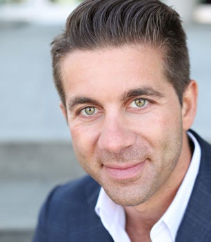 Portrait of AJ Hazzi, Founder,  Managing Broker.